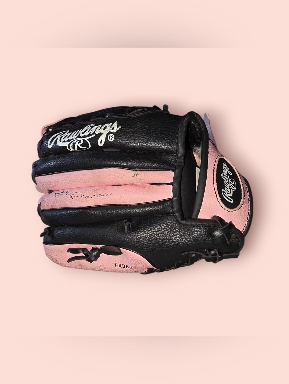 ^ Rawlings Black and Pink Performance Baseball Glove